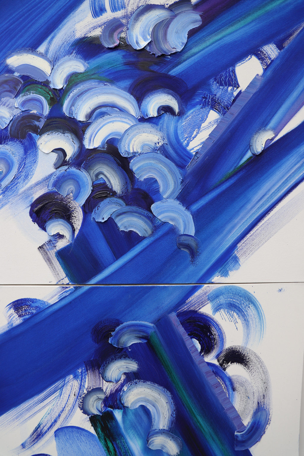 Close up of blue and white abstract painting
