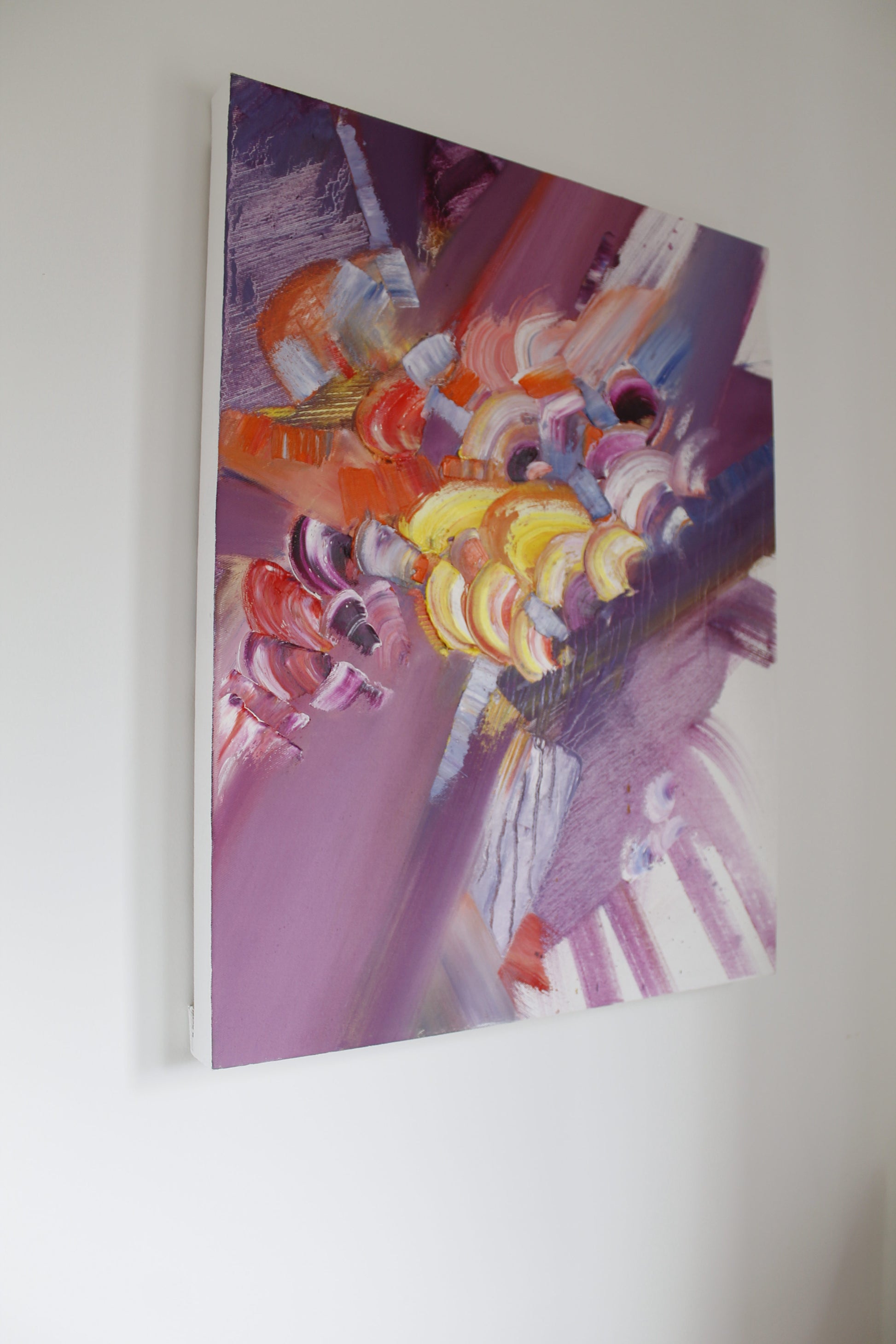Colorful abstract painting on a white wall, interior painting, abstract